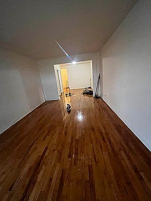 2nd image of 35-27 Leverich St #611
