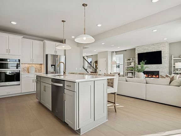 Standing in the kitchen, looking out at the gathering room