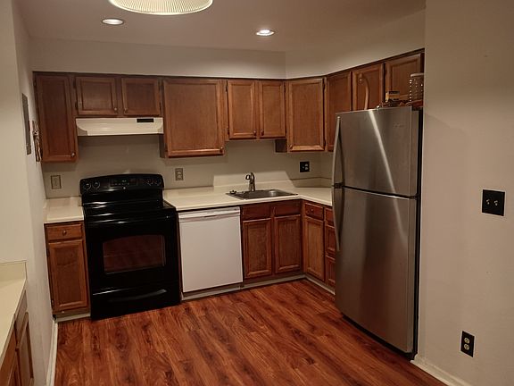 Kitchen area with lots of cupboards and counter space