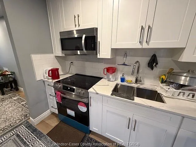 25 Giles Blvd E #MAIN LEVEL — Photo 9