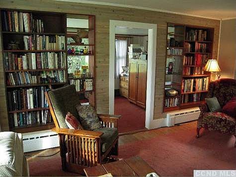 Living room with built-in bookcases.
