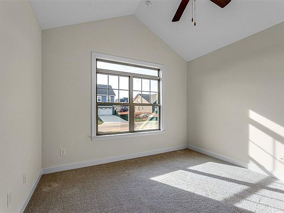 Second bedroom with vaulted ceiling