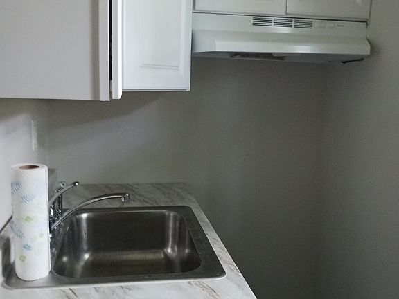 Kitchen, there is a stove installed