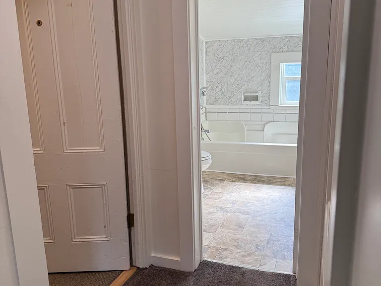 Just inside the entry with view toward bathroom (east wall)
