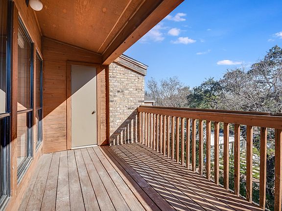 Balcony with storage closet. City Views