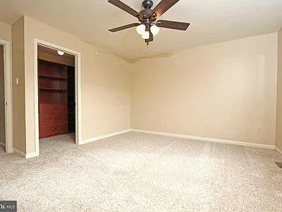 Master bedroom with walk-in closet 
- Second floor