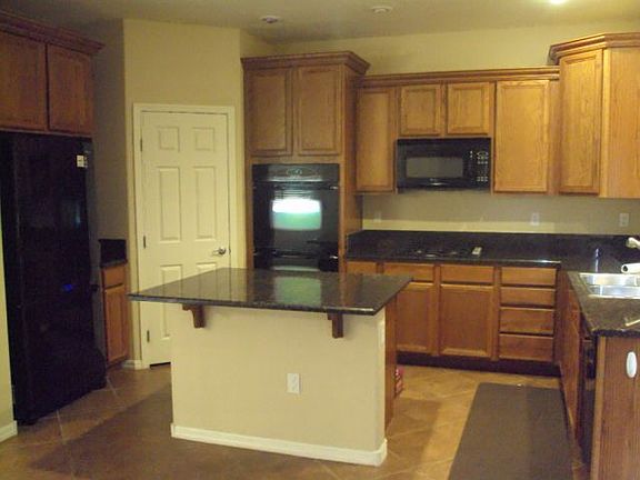 4th image of 12149 Las Hurdes Ave