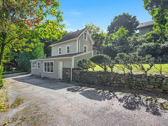 The stone walls speak to the origins of this historic farmhouse