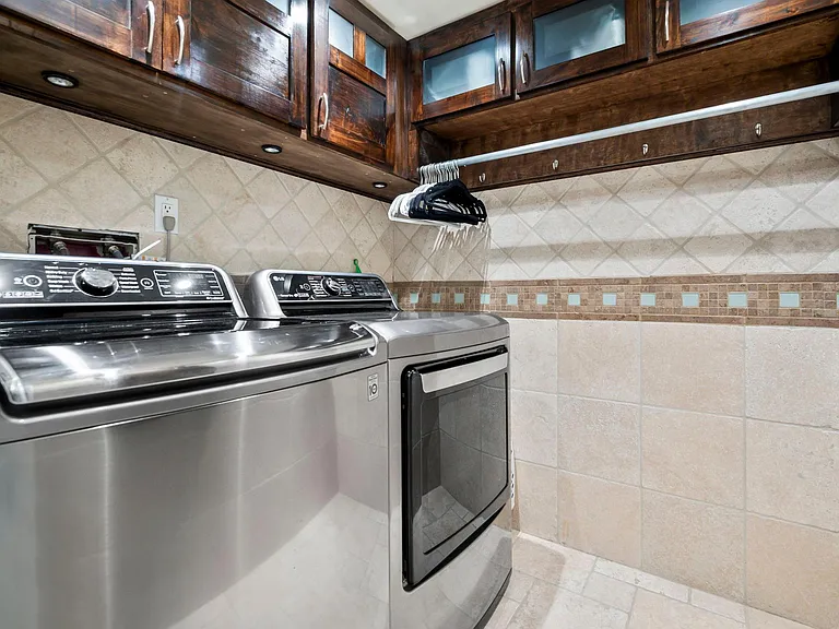 Washer and dryer set equipped with steam settings.