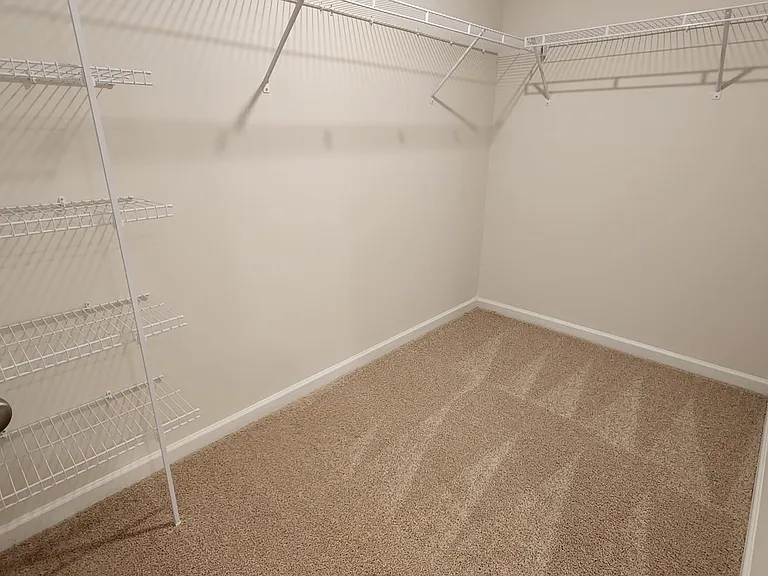 Master bedroom walk in closet