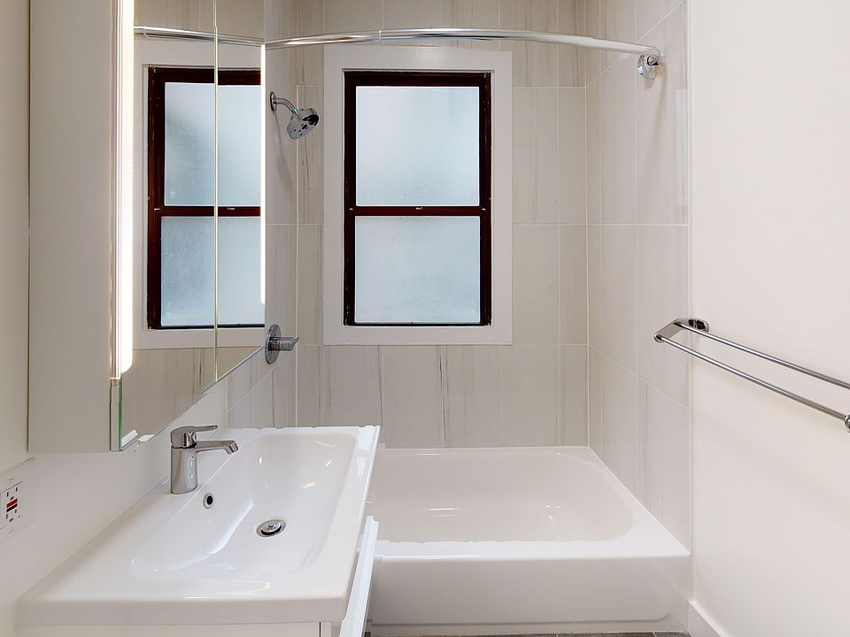 Bathroom with sink and bathtub