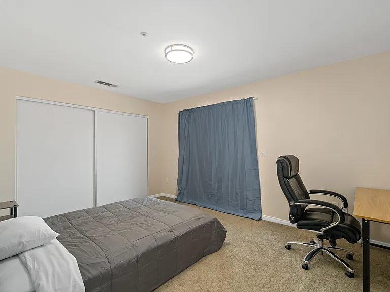 Unwind in your spacious, private bedroom, complete with essential furnishings.