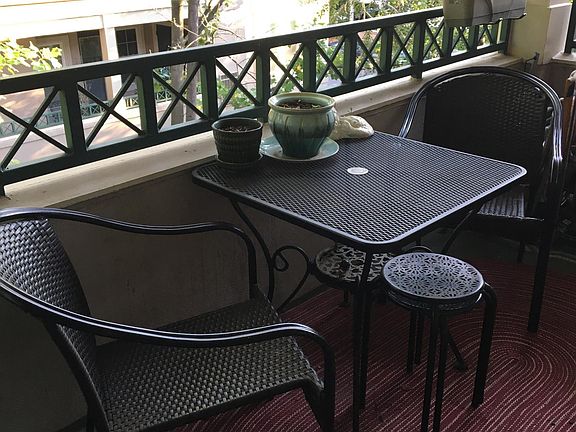 Balcony with garden view. 