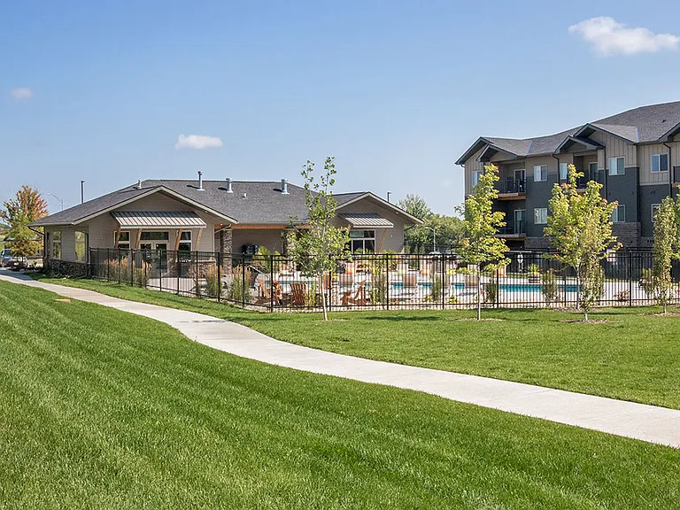 Back view of clubhouse and pool.