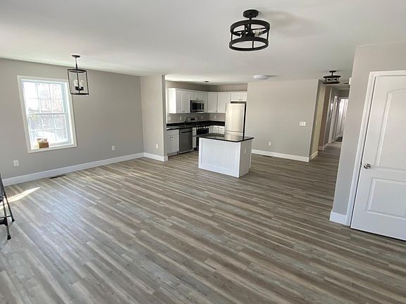 Open format living and dining room into kitchen