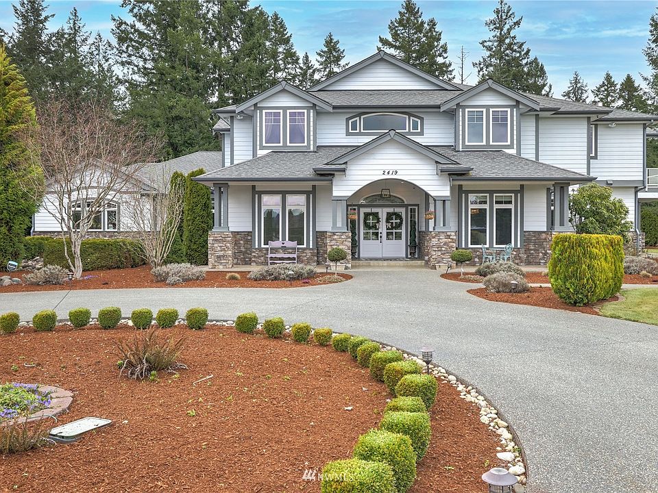 Welcome Home to this luxurious Rainier Prairie Estate