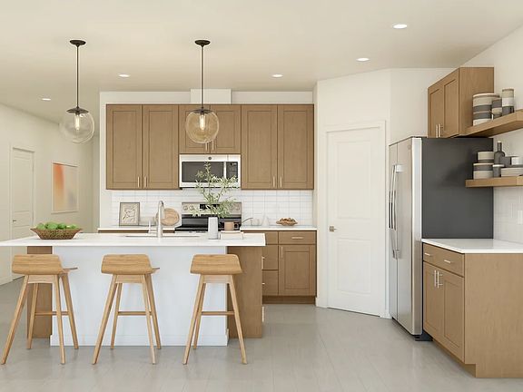 Kitchen with center island and pendant lights