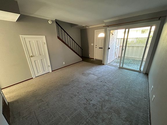 living room, front patio, under stairs closet