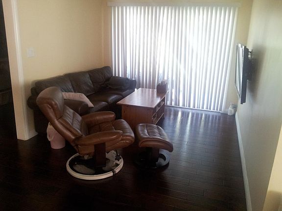 patio view living area - hardwood floors