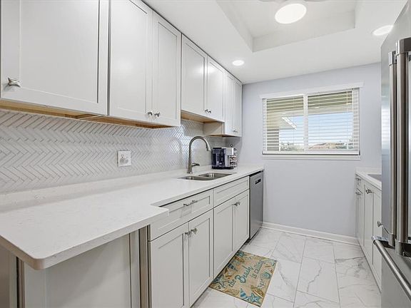 5th image of 649 Tamiami Trl S APT 306