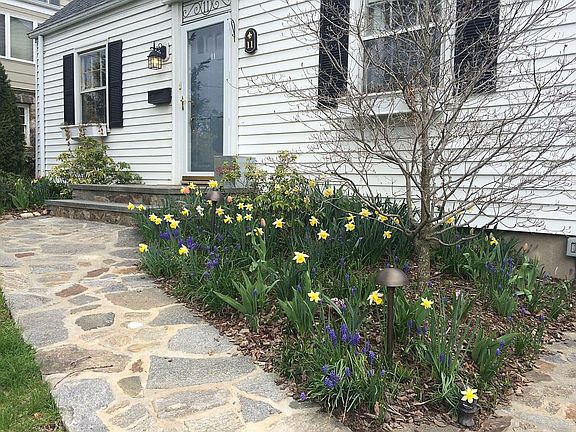 The front walk and flower beds