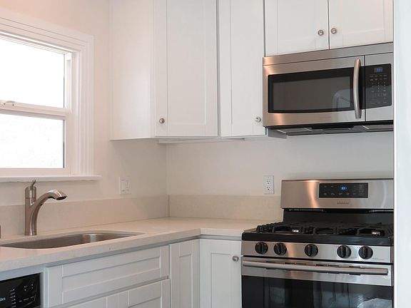 All Appliances Included - Dishwasher, Range, Microwave, Oven and Fridge