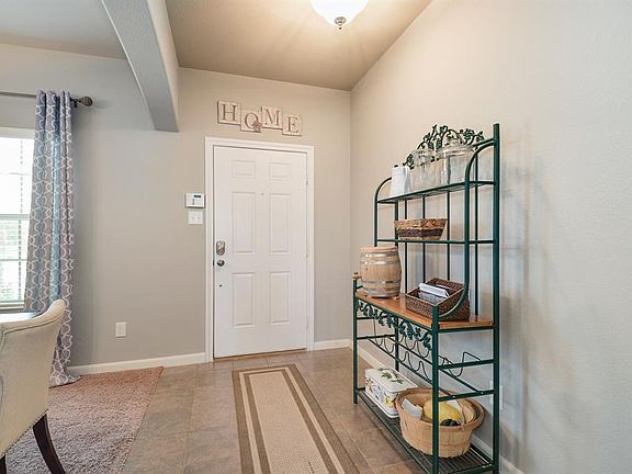 Entryway with formal dining to your right.