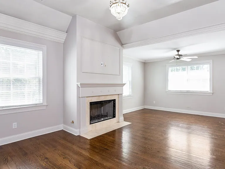 Master with Wood Burning Fireplace with Gas Ignitor Feature.