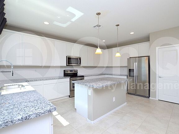 3rd image of 15855 W Port Royale Ln