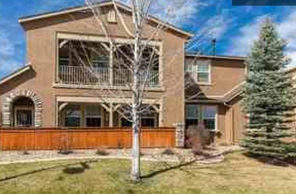 Condo side view - ground floor unit - no stairs; upstairs area & patio belongs to another unit in the building