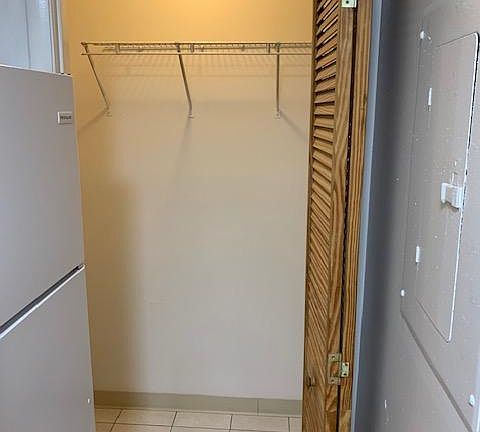 Fits a full size washer dryer- refrigerator is on the left