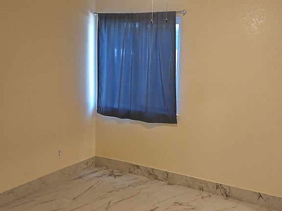 Master Bedroom, with walk in closet and laundry room on either side