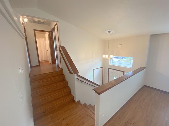 living room view to upstairs bedrooms and front entry
