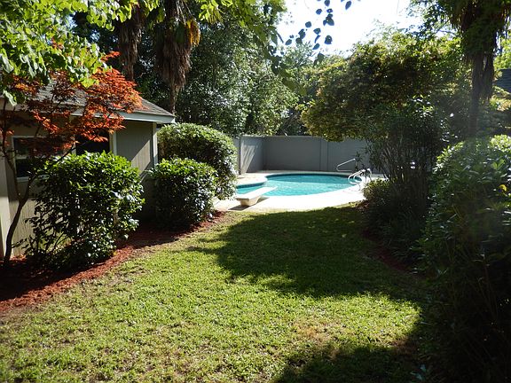 Other view of backyard, pool