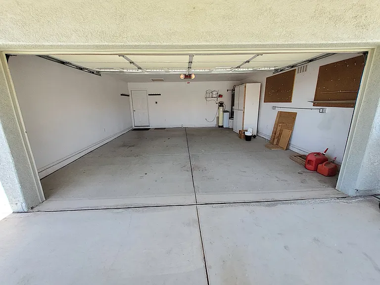 2 car Garage with storage cabinet