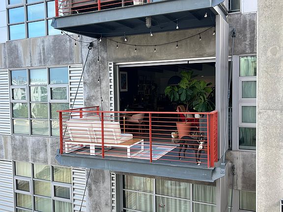 Large balcony with oversized sliding door