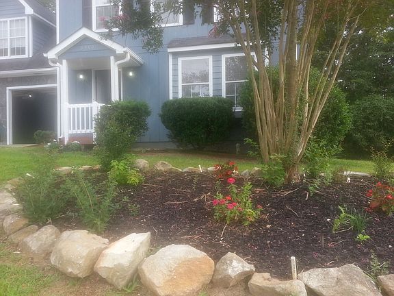 Landscaped with black mulch
