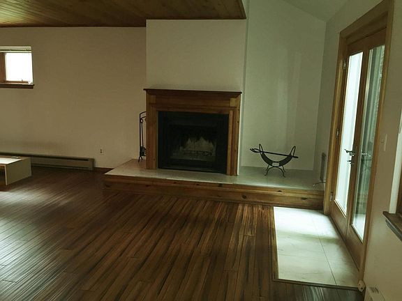 Living Room with cozy wood burning fireplace