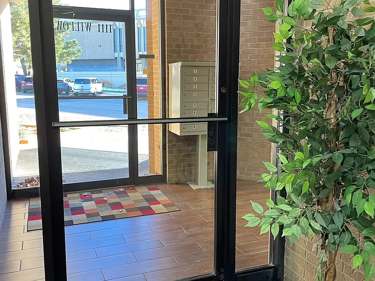 Exterior glass doors with Courthouse across the street