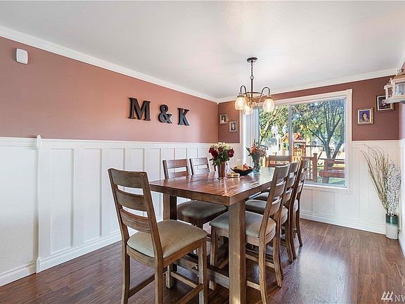 Formal dining room with amazing trim work. 