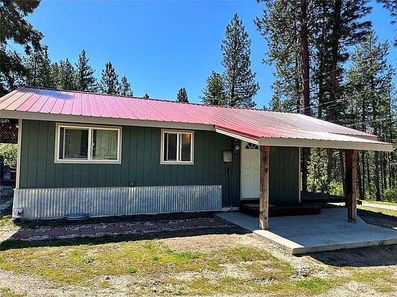 Home is on a large .42 acre lot & has a new covered front deck to enjoy the forest view of the community land across the road.>