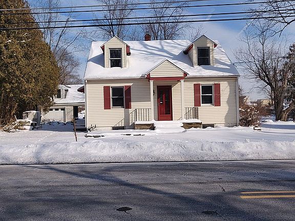 Street view. Driveway on left