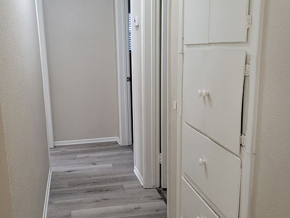 Hallway with cabinet space
