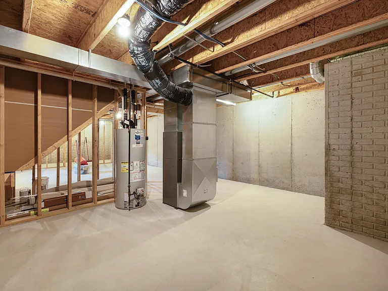 Basement - Finishing touches still in progress! Great additional storage throughout.