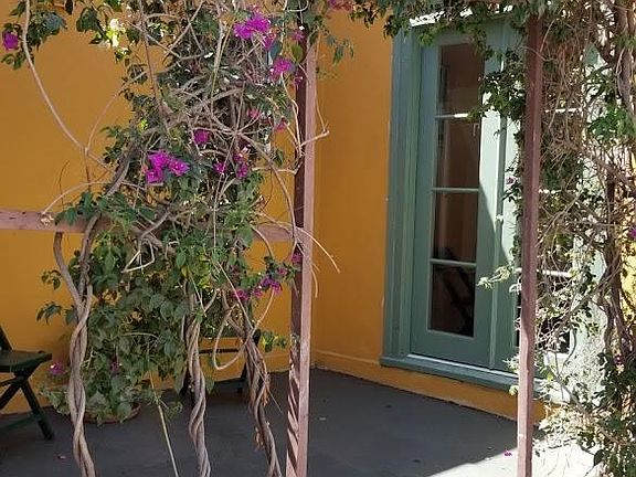 Side patio french doors to sun room