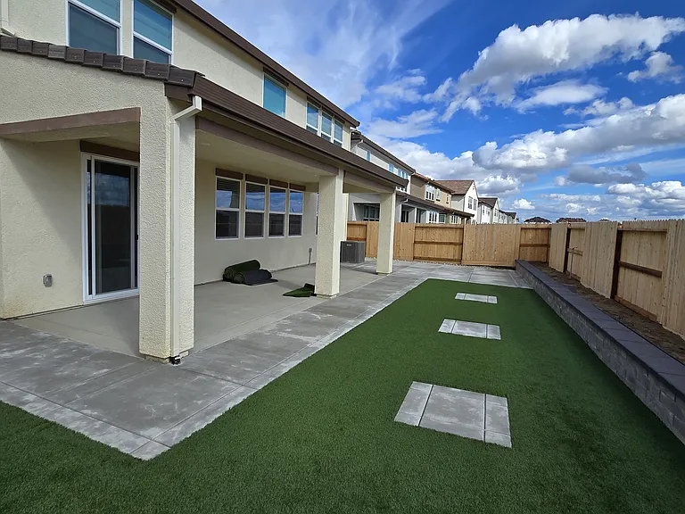 Backyard patio and landscaping
