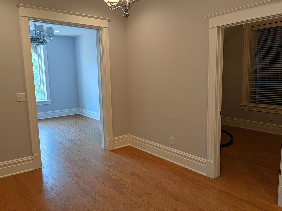 In dining room. At the left is the living room. At the right is bedroom 1