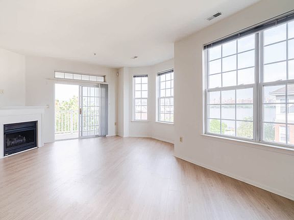 Living Room with Fireplace and Hard Surface Flooring