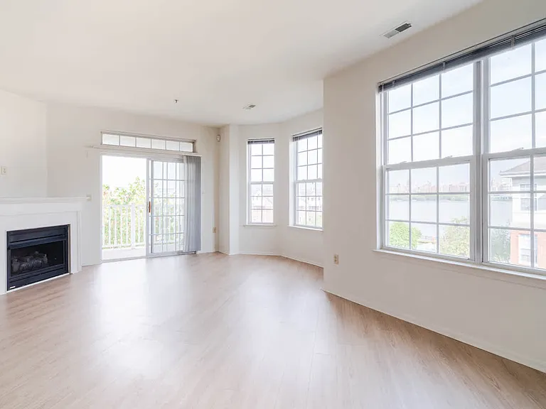 Living Room with Fireplace and Hard Surface Flooring