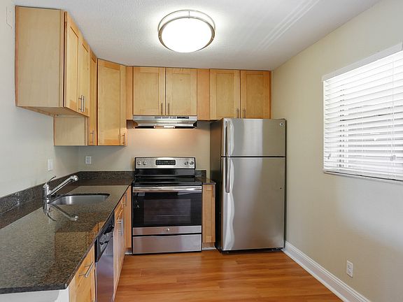 Enjoy upgraded kitchen cabinets and ample counter space